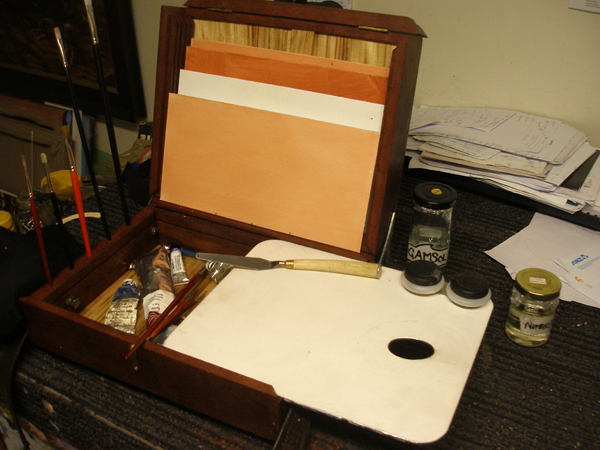 A photo of the construction of an artists painting box