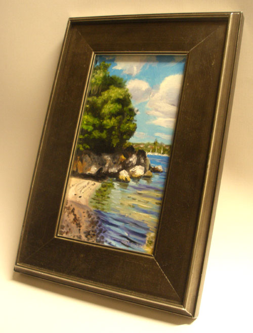A framed oil painting of the Swan River in Perth