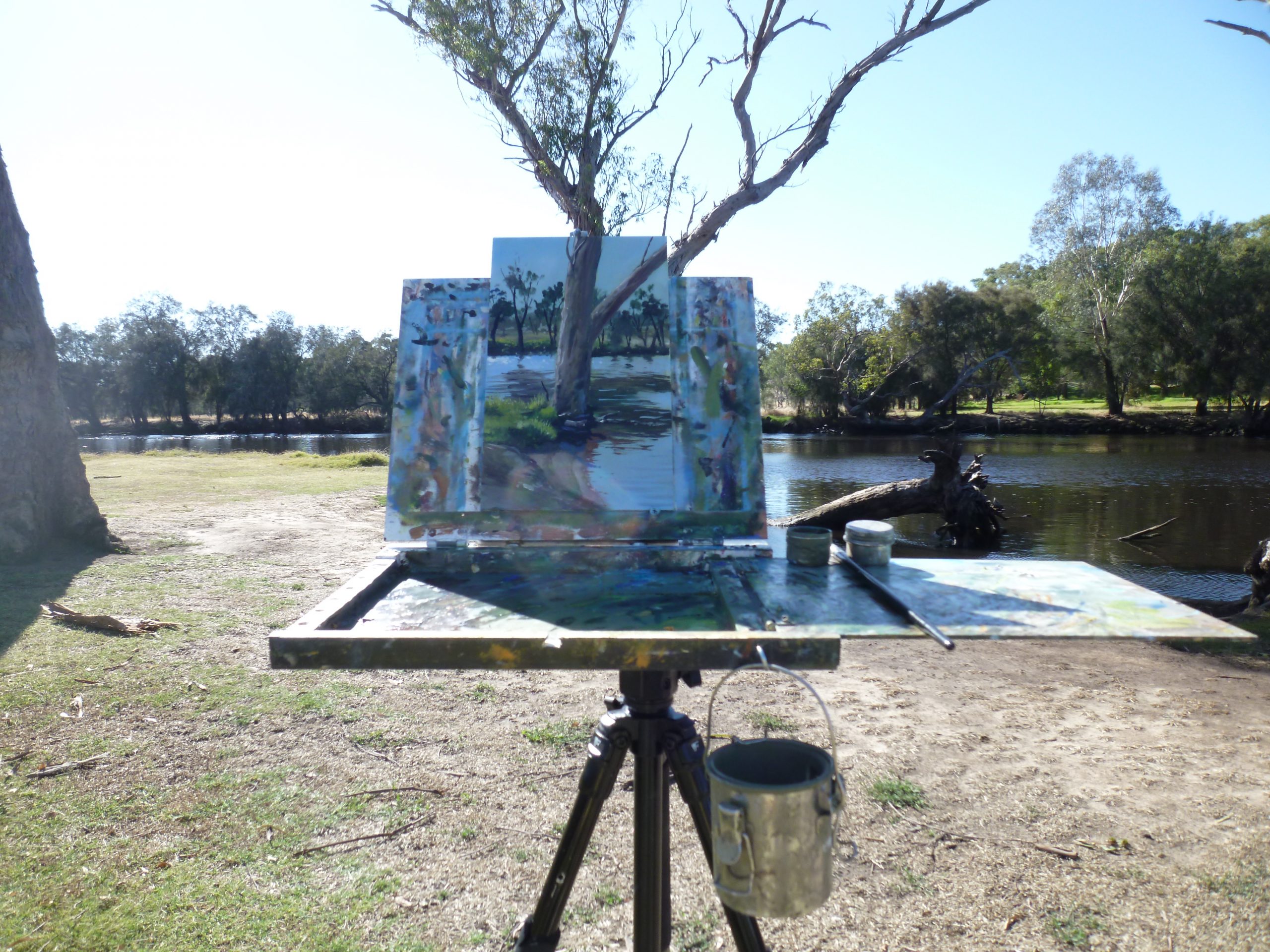 An artists easel on the shore of the Swan River in Perth Western Australia