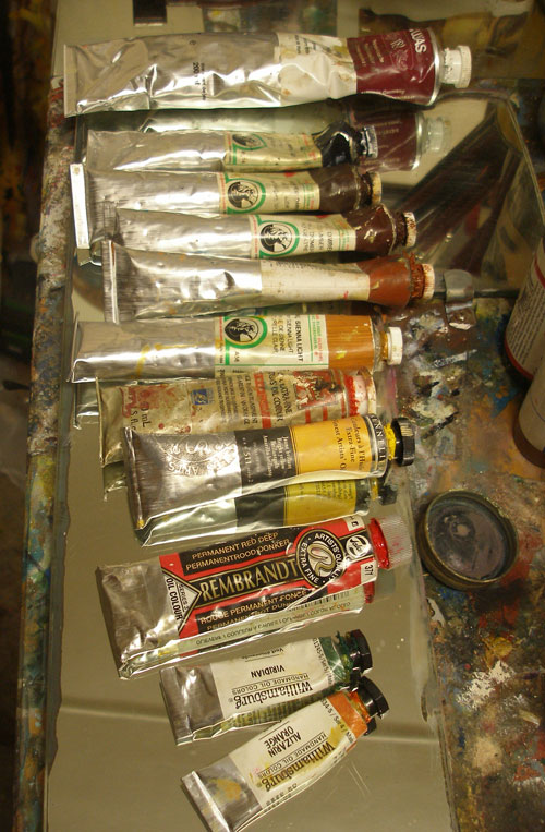 Artists oil paint colours laid out ready to use